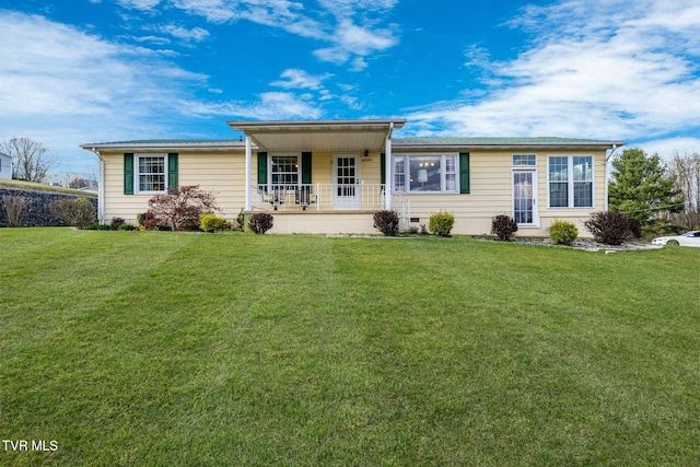 ranch-style house with a front yard and covered porch
