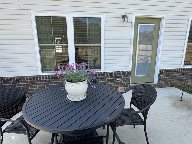 view of patio featuring outdoor dining space