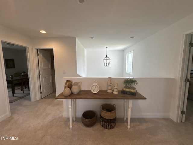 interior space with baseboards, carpet flooring, and recessed lighting