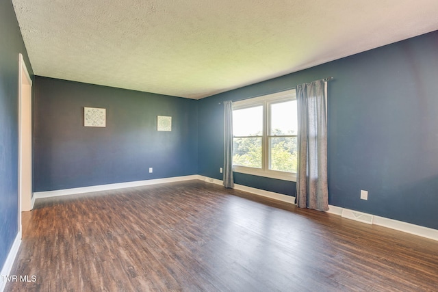 132 Lancaster Dr, Kingsport, TN 37663 - unfurnished room featuring wood finished floors and a textured ceiling