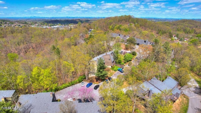 bird's eye view featuring a forest view