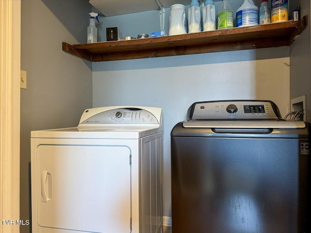 laundry area with washer and dryer and laundry area