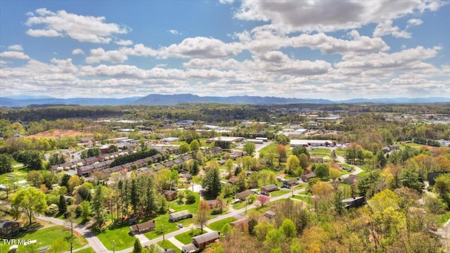 birds eye view of property featuring a mountain view and a residential view