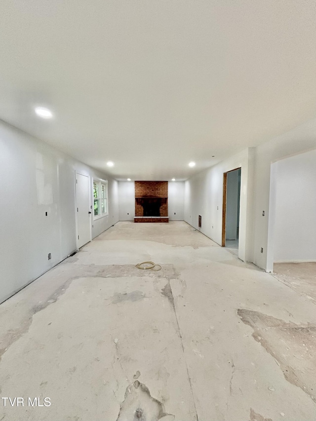 677 Summit Dr, Jonesborough, TN 37659 - unfurnished living room featuring a fireplace and recessed lighting