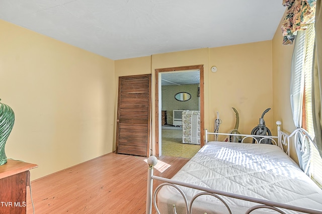 bedroom with light wood finished floors