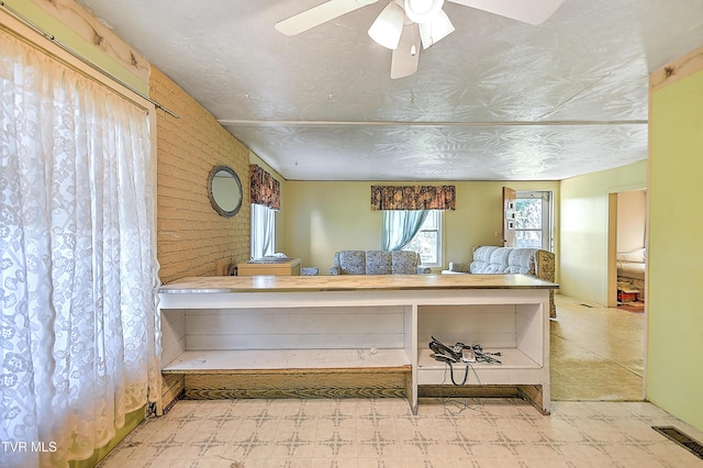 interior space featuring tile patterned floors and visible vents