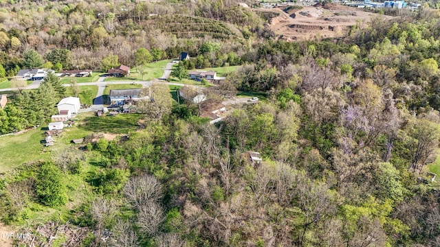 aerial view with a wooded view