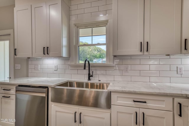 74 Slonaker Cir, Jonesborough, TN 37659 - kitchen with backsplash, light stone counters, dishwasher, and a sink