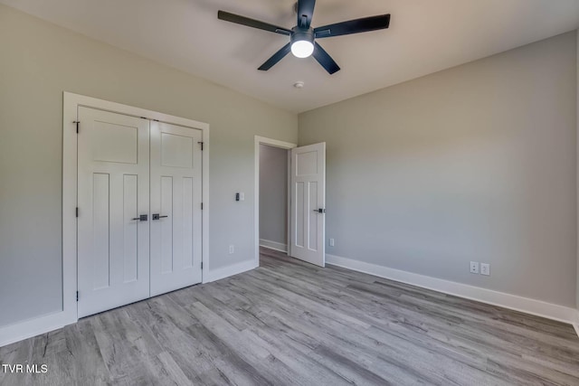 74 Slonaker Cir, Jonesborough, TN 37659 - unfurnished bedroom with baseboards, wood finished floors, ceiling fan, and a closet