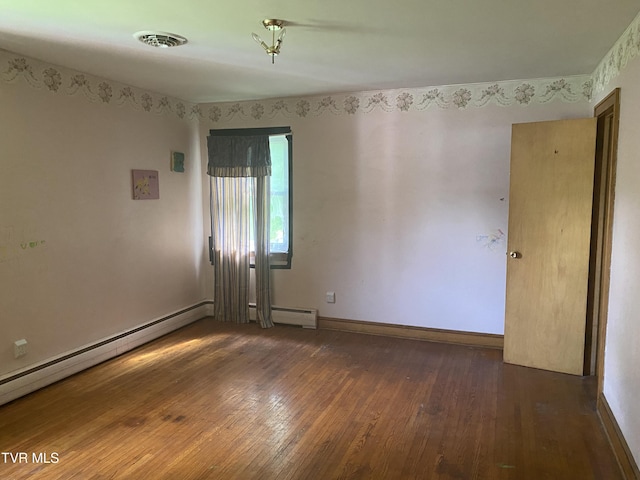 6192 Hurricane Rd, Wise, VA 24293 - spare room featuring wood-type flooring and a baseboard heating unit