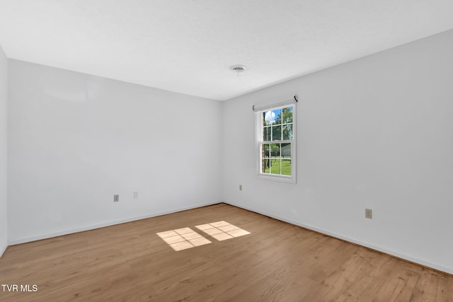 511 Hickory Rd Unit 511, Bristol, TN 37620 - spare room with wood finished floors, baseboards, and visible vents