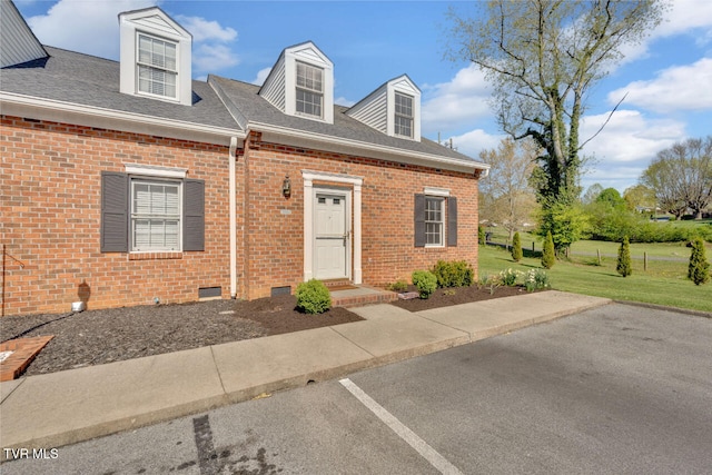 511 Hickory Rd Unit 511, Bristol, TN 37620 - cape cod house featuring roof with shingles, brick siding, crawl space, and a front lawn
