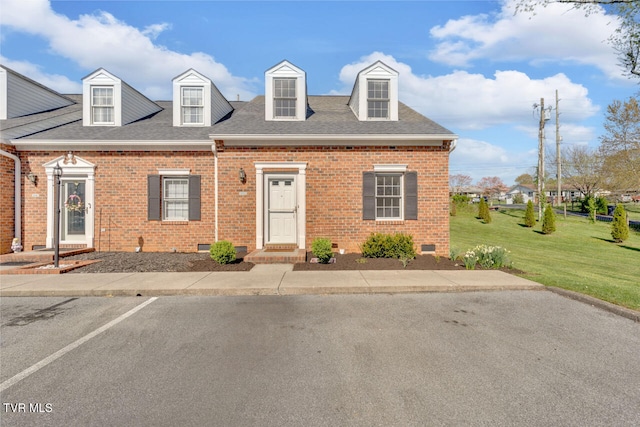 511 Hickory Rd Unit 511, Bristol, TN 37620 - new england style home featuring brick siding, a front lawn, a shingled roof, and crawl space
