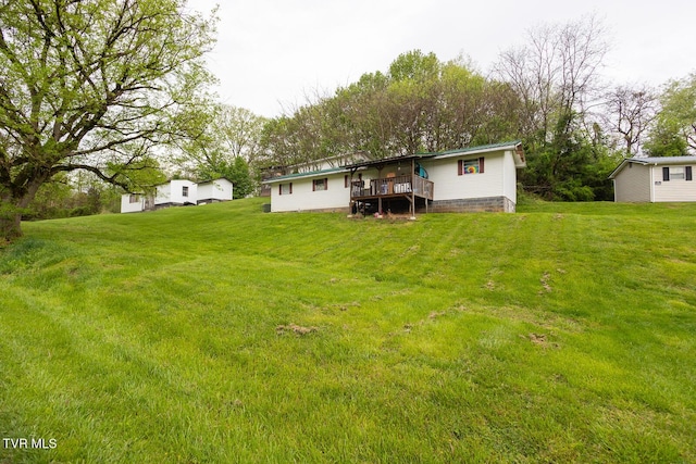 view of yard featuring a deck