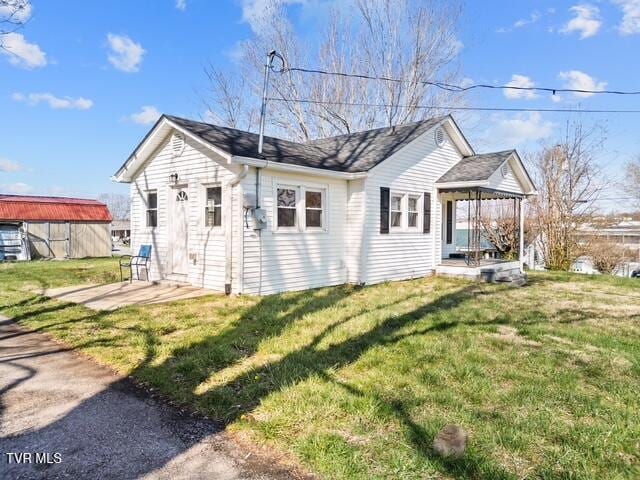 112 Morrow Ln, Greeneville, TN 37745 - rear view of house with a lawn