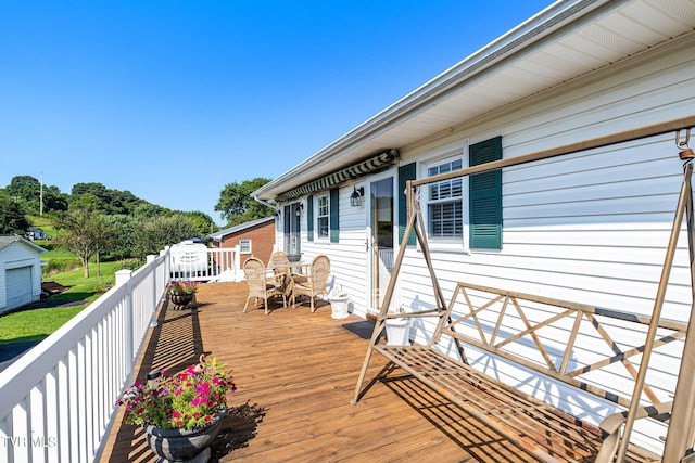 deck featuring outdoor dining space