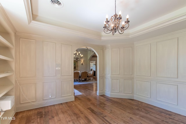 20268 Heron Cir, Abingdon, VA 24211 - unfurnished dining area with arched walkways, visible vents, a raised ceiling, and a chandelier