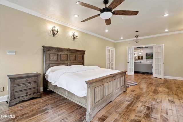 20268 Heron Cir, Abingdon, VA 24211 - bedroom featuring crown molding, french doors, recessed lighting, and wood finished floors