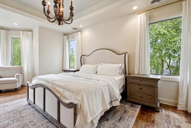 20268 Heron Cir, Abingdon, VA 24211 - bedroom featuring baseboards, recessed lighting, wood finished floors, and a chandelier