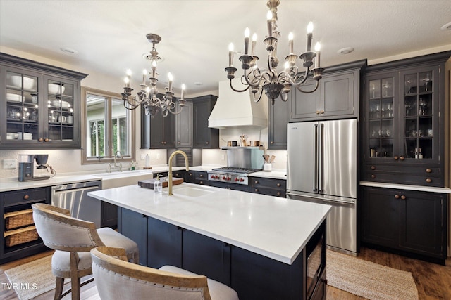 20268 Heron Cir, Abingdon, VA 24211 - kitchen featuring an inviting chandelier, a sink, wood finished floors, and stainless steel appliances