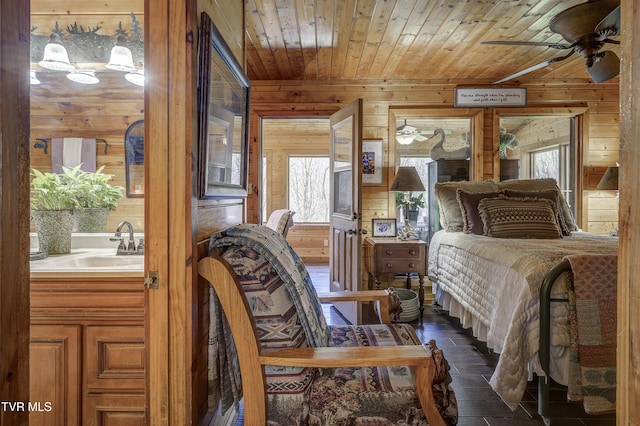223 Black Bear Rdg, Roan Mountain, TN 37687 - bedroom featuring wooden walls, a sink, and wood ceiling
