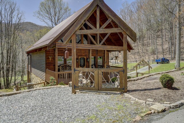 223 Black Bear Rdg, Roan Mountain, TN 37687 - exterior space featuring a wooded view and a mountain view