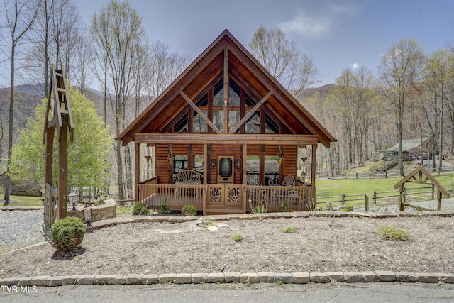 223 Black Bear Rdg, Roan Mountain, TN 37687 - view of front of property with a mountain view and fence
