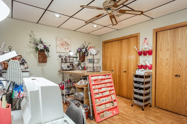 interior space featuring recessed lighting, a ceiling fan, and wood finished floors