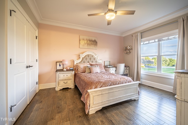 bedroom with visible vents, baseboards, ornamental molding, a ceiling fan, and dark wood-type flooring