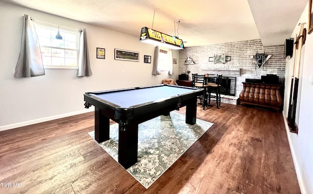2215 Knob Creek Rd, Johnson City, TN 37604 - playroom with brick wall, baseboards, billiards, and wood finished floors