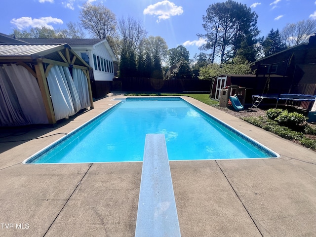 2215 Knob Creek Rd, Johnson City, TN 37604 - view of pool featuring a fenced in pool, a patio area, a diving board, and fence