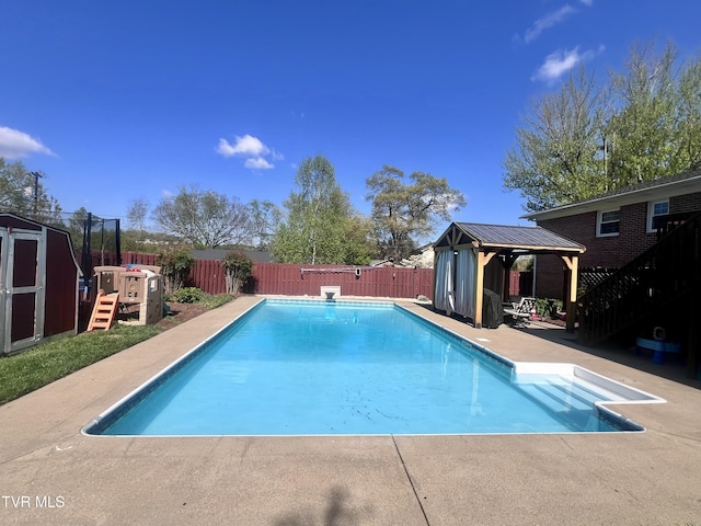 2215 Knob Creek Rd, Johnson City, TN 37604 - view of pool with a storage shed, a patio area, a gazebo, a fenced backyard, and a fenced in pool