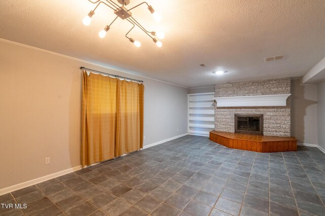 unfurnished living room featuring crown molding, a fireplace, a textured ceiling, visible vents, and baseboards