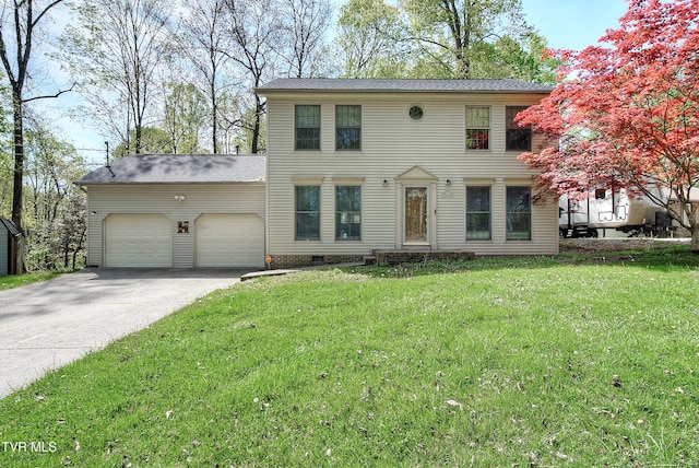 455 Carlton Rd, Bristol, TN 37620 - colonial house featuring a front lawn, driveway, and a garage