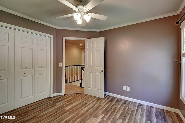 455 Carlton Rd, Bristol, TN 37620 - unfurnished bedroom with baseboards, wood finished floors, and a closet