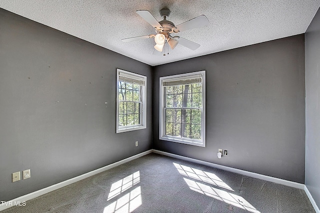 455 Carlton Rd, Bristol, TN 37620 - carpeted empty room with a textured ceiling, a ceiling fan, and baseboards