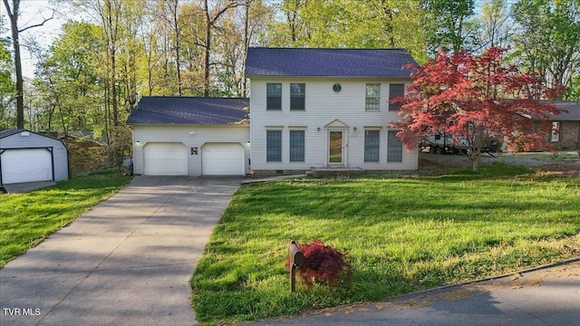 455 Carlton Rd, Bristol, TN 37620 - colonial inspired home featuring concrete driveway, a front lawn, and a garage