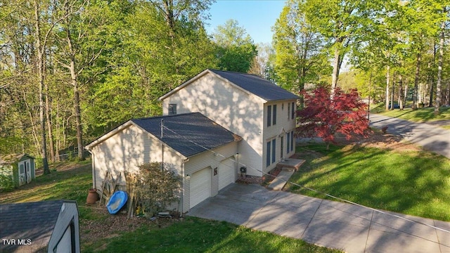 455 Carlton Rd, Bristol, TN 37620 - view of side of property with concrete driveway and a lawn