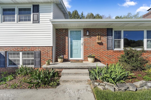 610 Pine Hill Rd, Elizabethton, TN 37643 - doorway to property with brick siding