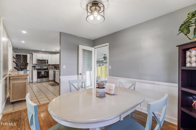 610 Pine Hill Rd, Elizabethton, TN 37643 - dining space featuring a ceiling fan, light wood-style floors, wainscoting, and recessed lighting