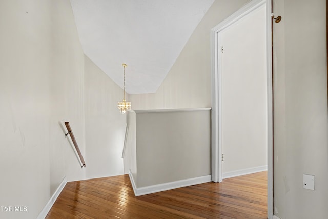 1023 Pebble Dr, Bristol, VA 24201 - corridor featuring baseboards, wood-type flooring, and an upstairs landing