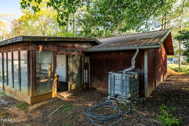 view of outbuilding featuring cooling unit