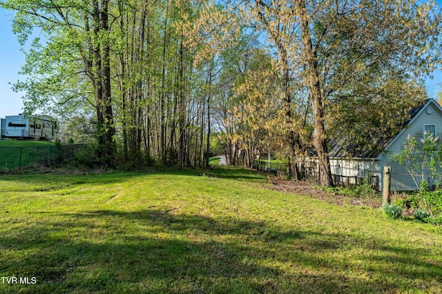 view of yard with fence