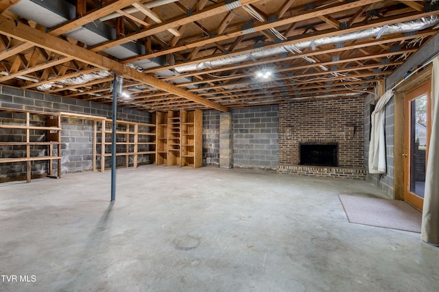 basement featuring a fireplace