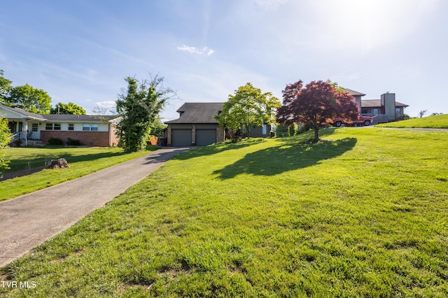 view of front of house featuring a front lawn and brick siding
