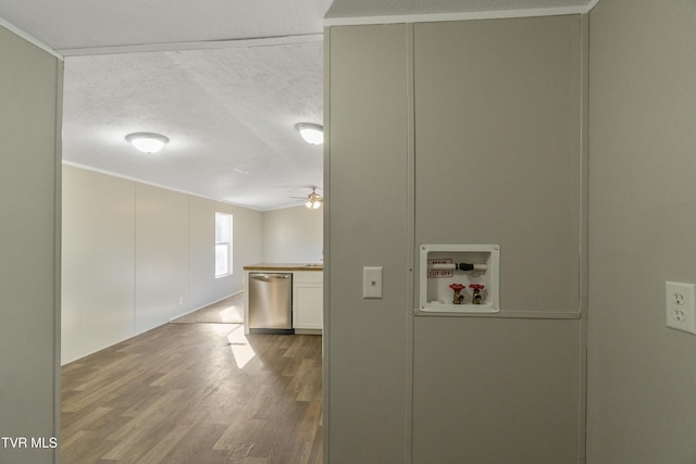 810 Sugar Bowl Rd, Chuckey, TN 37641 - clothes washing area with a textured ceiling, a ceiling fan, washer hookup, and wood finished floors