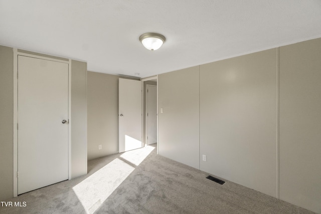 810 Sugar Bowl Rd, Chuckey, TN 37641 - unfurnished bedroom with visible vents and carpet