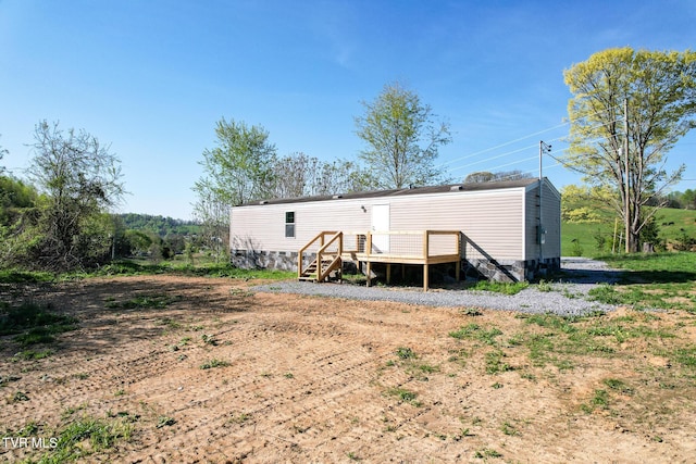 810 Sugar Bowl Rd, Chuckey, TN 37641 - back of property featuring a wooden deck