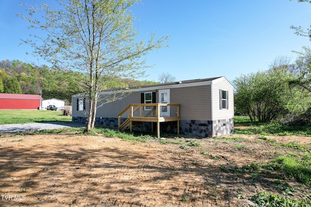 810 Sugar Bowl Rd, Chuckey, TN 37641 - manufactured / mobile home with a wooden deck