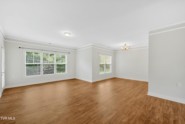 211 University Pkwy Unit 5, Johnson City, TN 37604 - empty room with crown molding, a wealth of natural light, and a chandelier